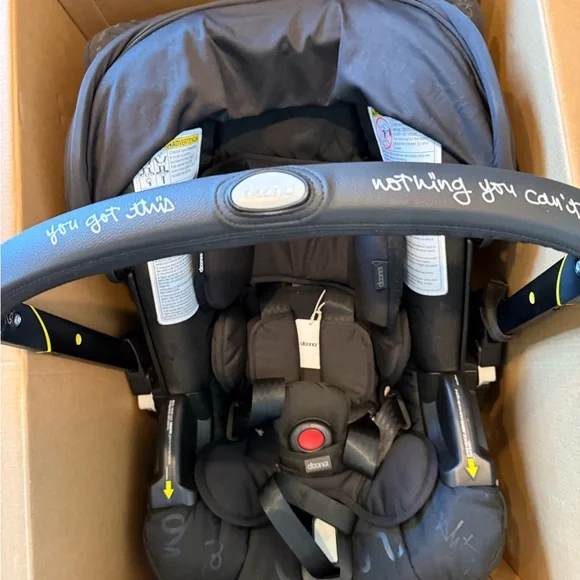 Doona Infant Car Seat & Stroller in Black with Yellow Accents - Picture 8 of 9